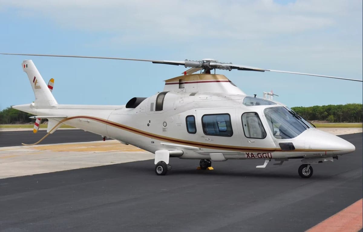 AgustaWestland AW109 helicopter on the tarmac.