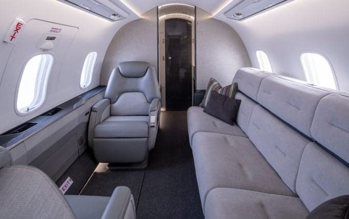 Aircraft interior with leather seats.