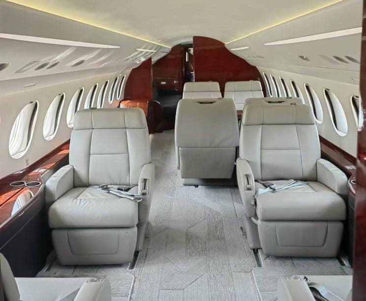 View of the aircraft interior with leather seats.