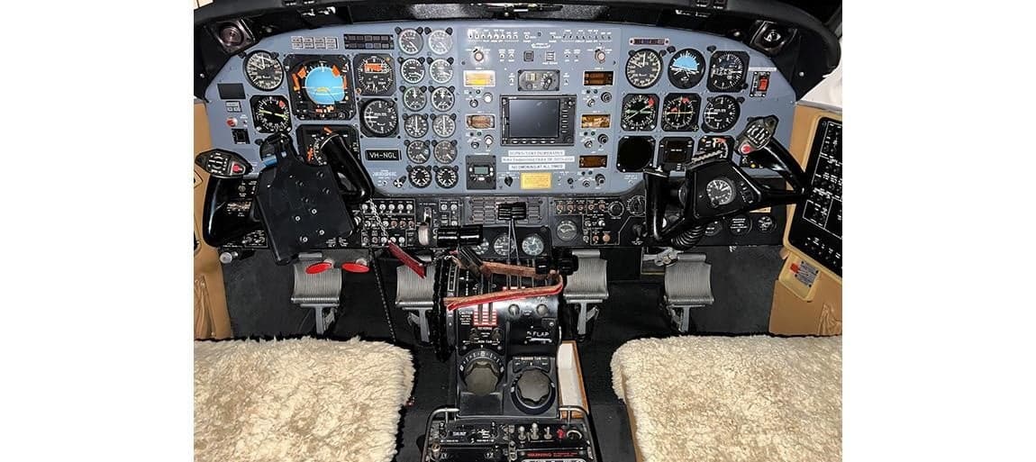 Detailed view of the Beechcraft King Air cockpit instrument panel.