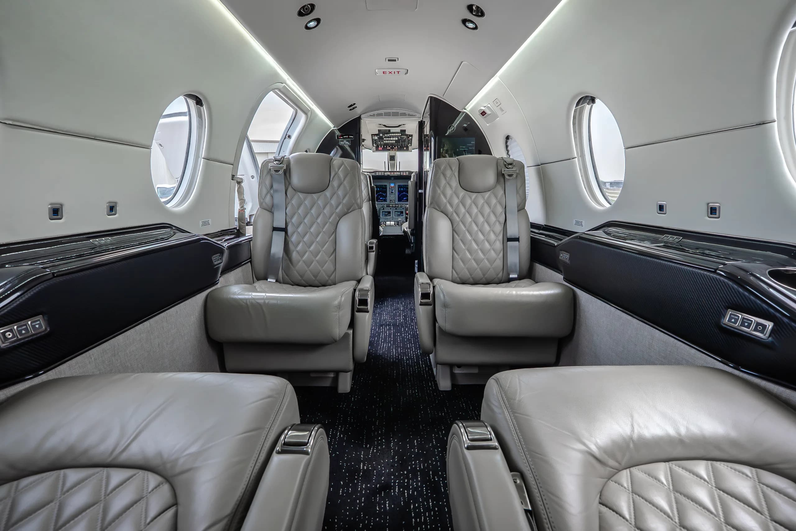 View of the aircraft cabin with leather seats.