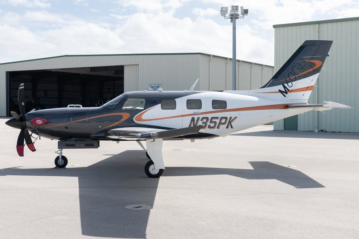 A Piper M600 HALO, registration N35PK, is parked on the tarmac.