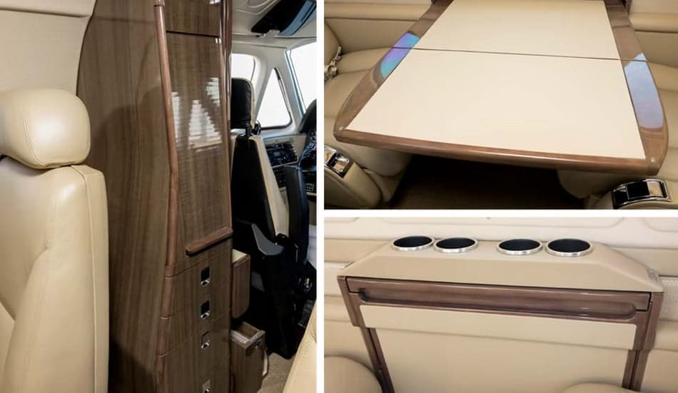 Close-up of the aircraft's interior showing the table and storage compartments.