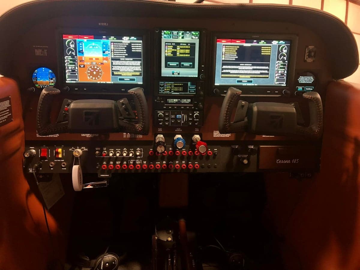 View of the Cessna 185 instrument panel with modern avionics.