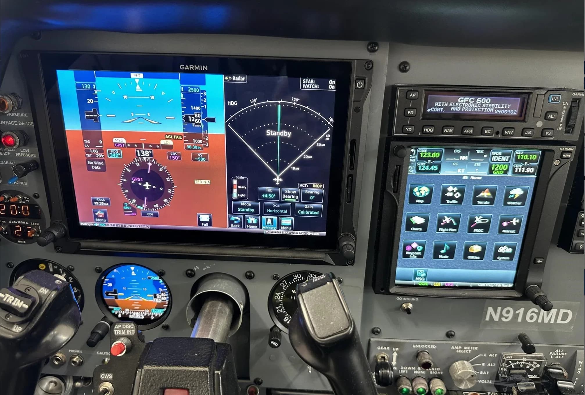 A detailed view of the N916MD cockpit's Garmin primary flight display and multifunction display.