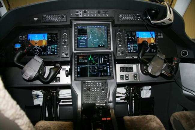 Detailed view of the Pilatus PC-12 cockpit instrument panel.