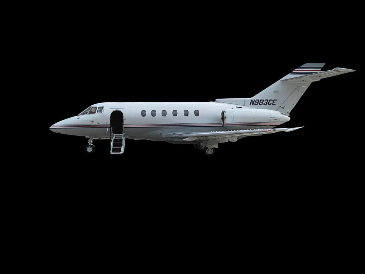 Side view of a white aircraft with the door open against a black background.