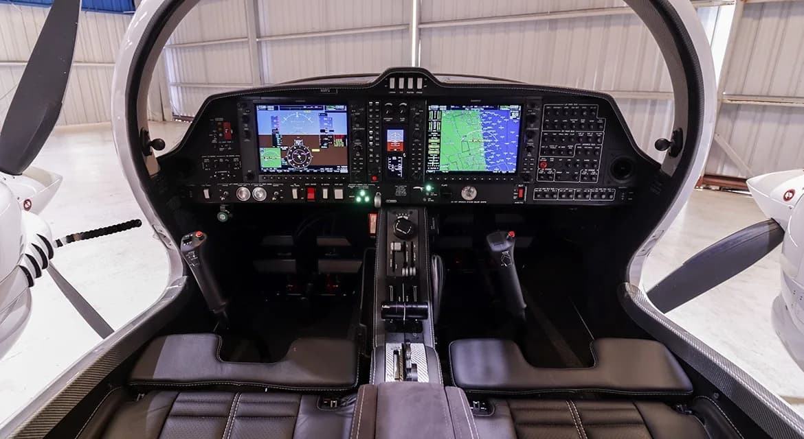 View of the Diamond DA62 cockpit featuring a modern glass panel.
