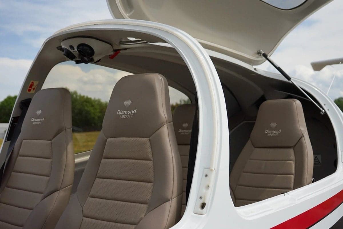Interior view of the aircraft showing the seats with Diamond Aircraft logo.
