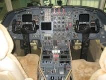 The cockpit of the aircraft features a full instrument panel.