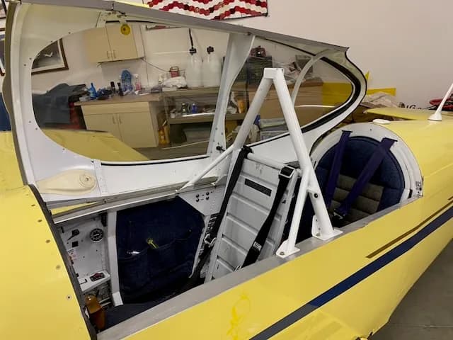 Interior view of the N639TB aircraft showing the seat and open canopy.