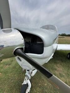 Close-up of the aircraft's engine and propeller.