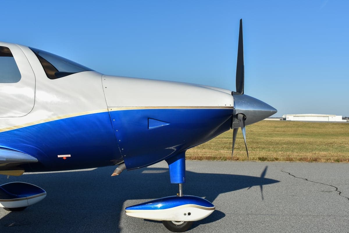 Cirrus VK-30 aircraft N2517X, side view on the ground.
