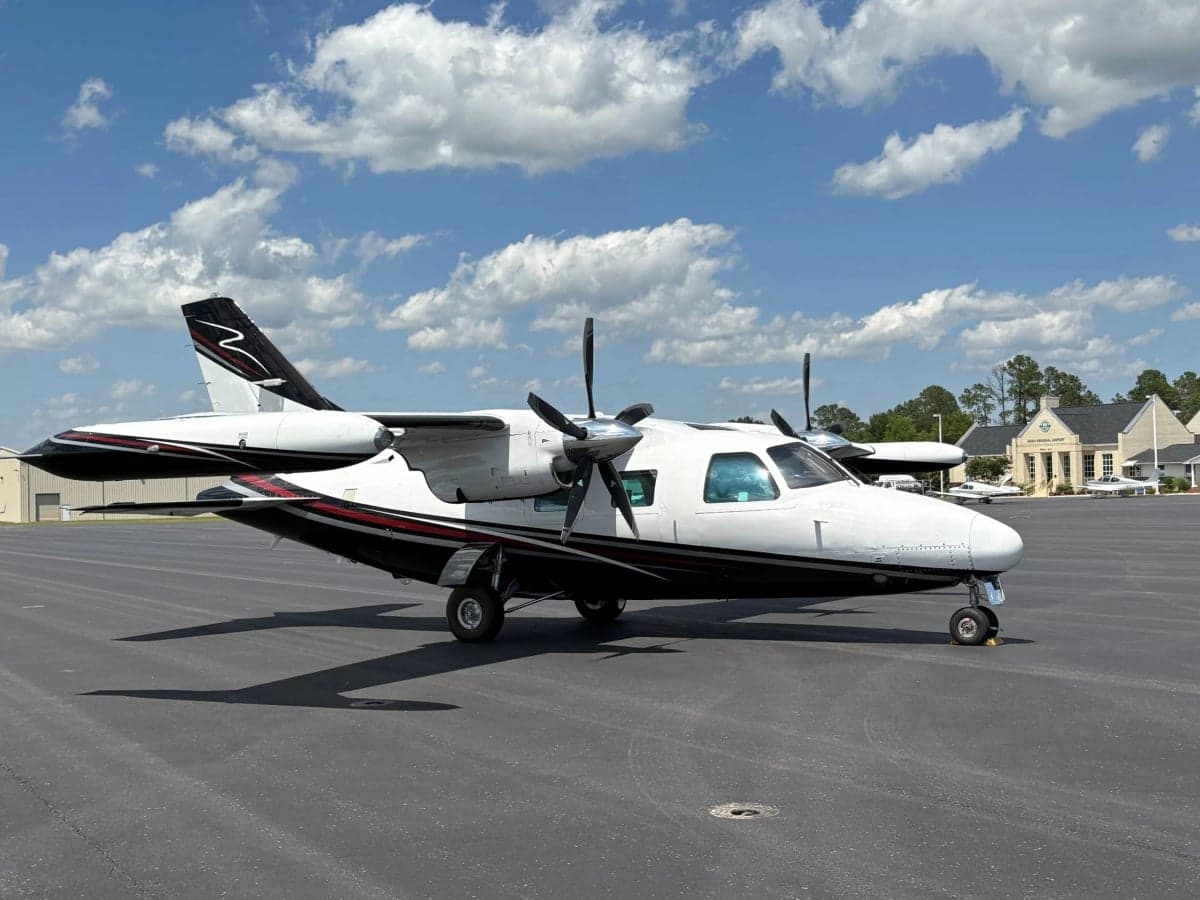 A three-quarter view of the Partenavia P.68 Observer 2 aircraft N616KL on the tarmac.