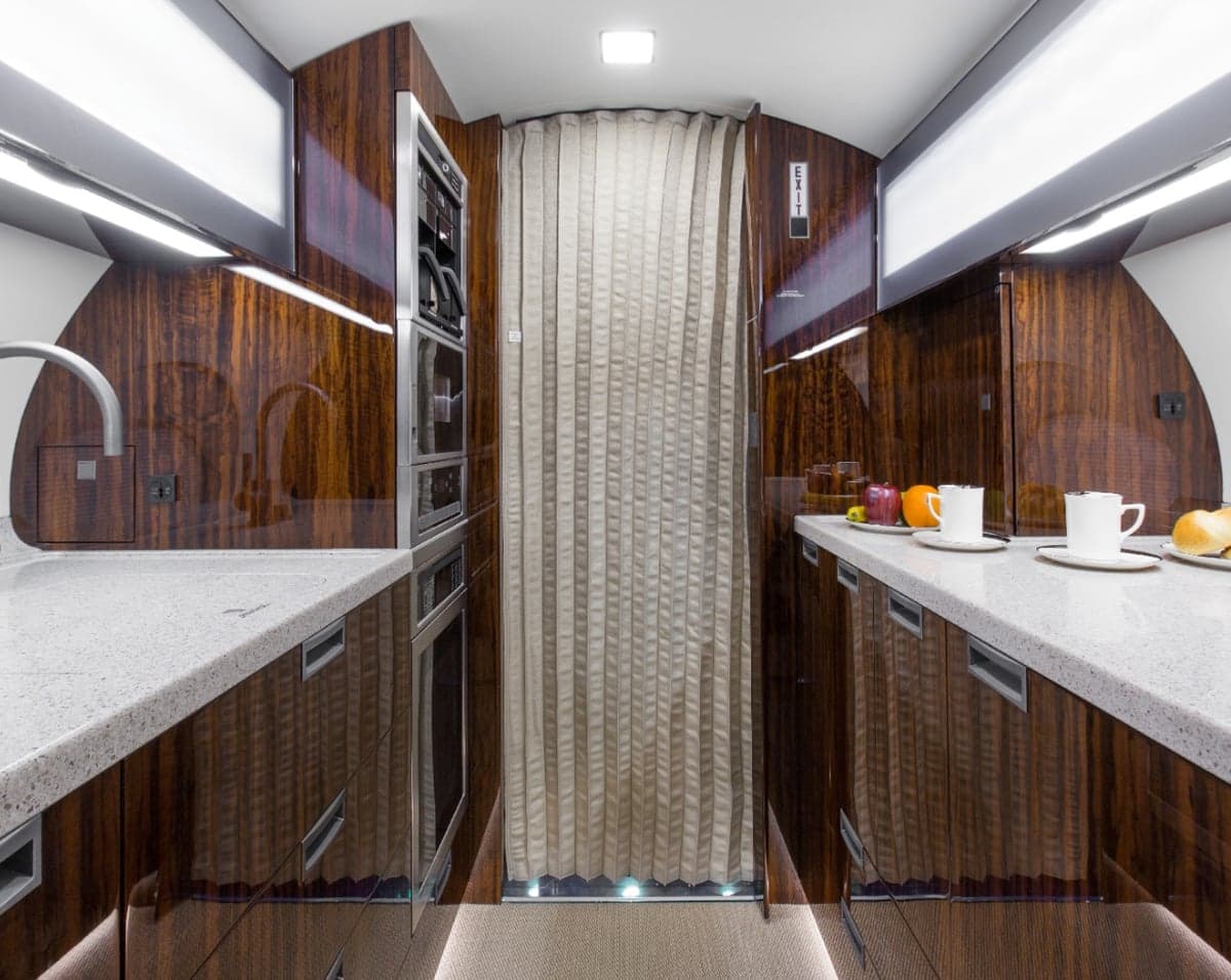 A view of the aircraft's galley with a sink and appliances.