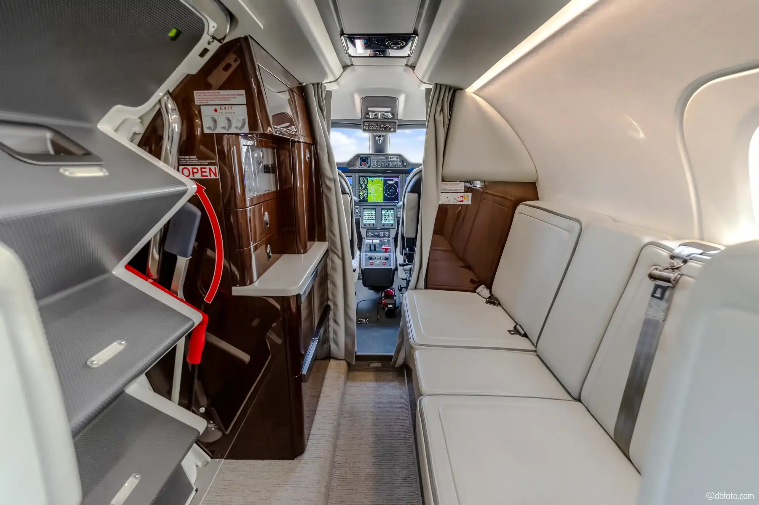 View of the aircraft interior showing the cabin and cockpit.