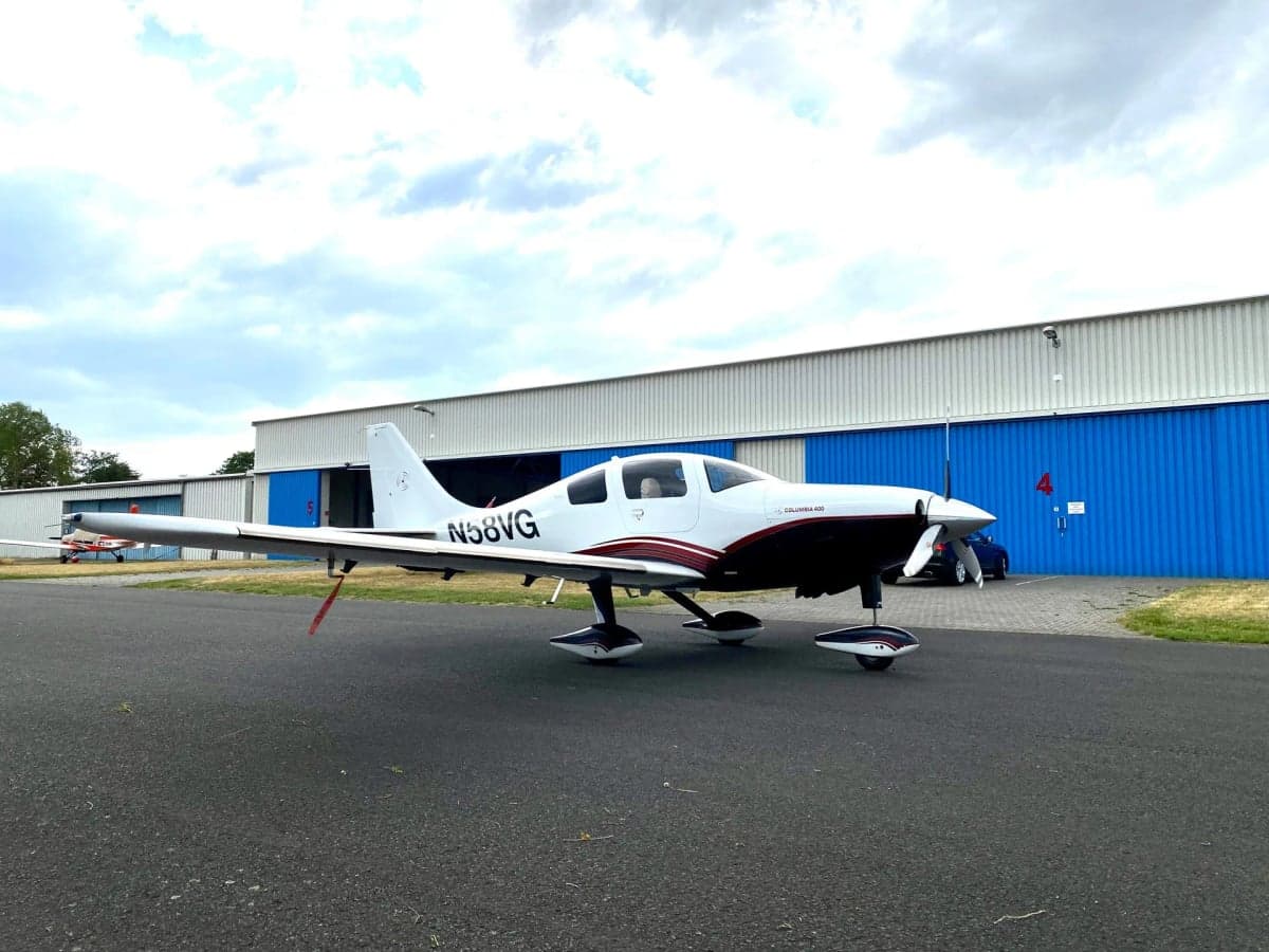 Columbia 400 aircraft N58VG parked on the tarmac.