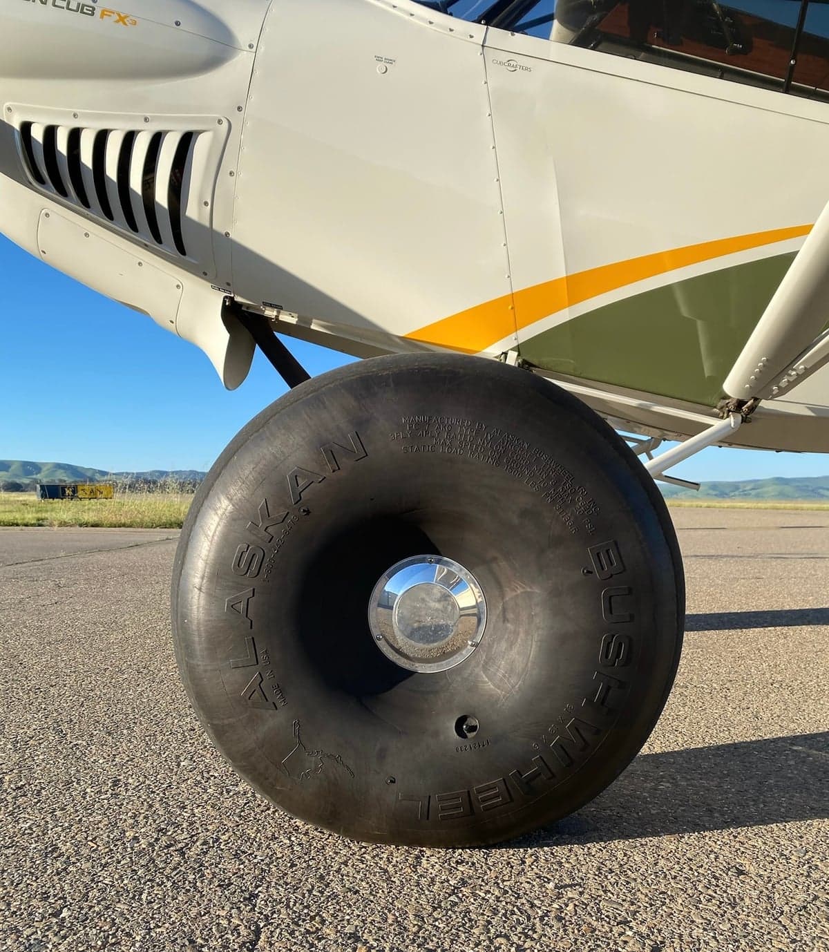 Close up of the Alaskan Bushwheel tire on a Carbon Cub FX-3 aircraft.