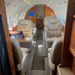 Hawker 750 with open airstair on the ramp.