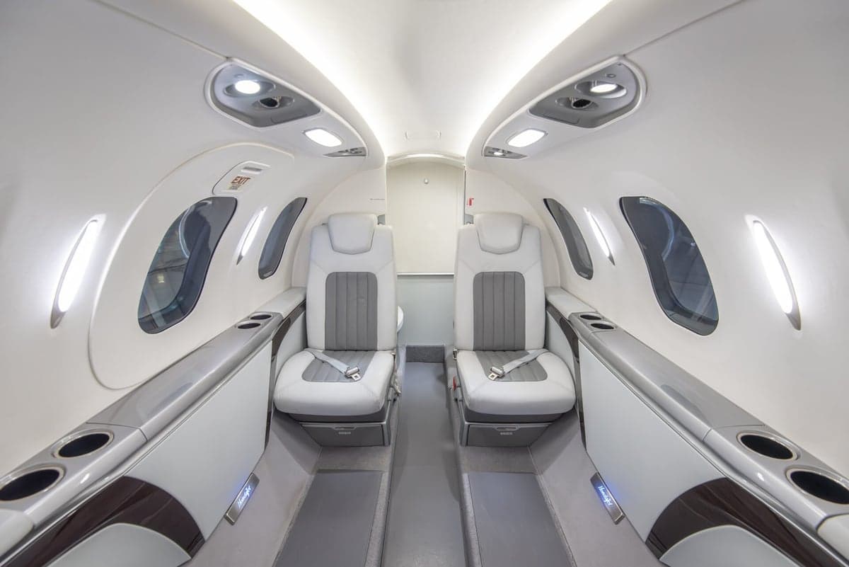 HondaJet HA-420 cabin interior with tables.