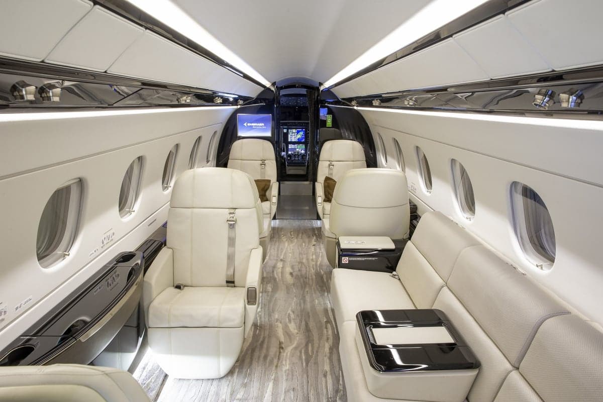 Interior view of the Embraer Legacy 500 cabin looking towards the cockpit.