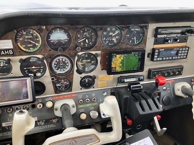 Close-up of the aircraft's instrument panel and controls.