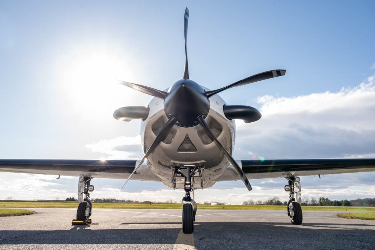 Front view of the Fury M700 aircraft with the sun shining behind it.