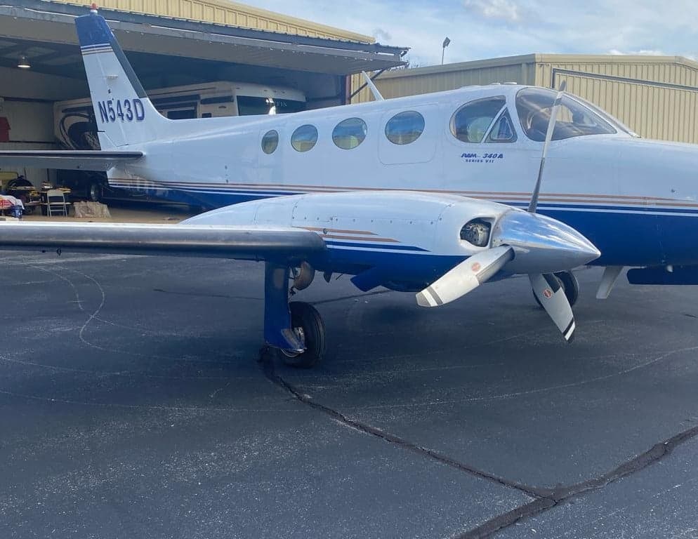 Close-up of the front of the Twin Cessna aircraft, registration N543D.
