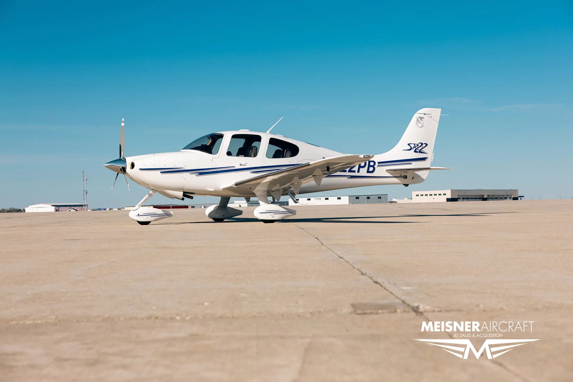 Cirrus SR22 aircraft, registration N722PB, on the ground.