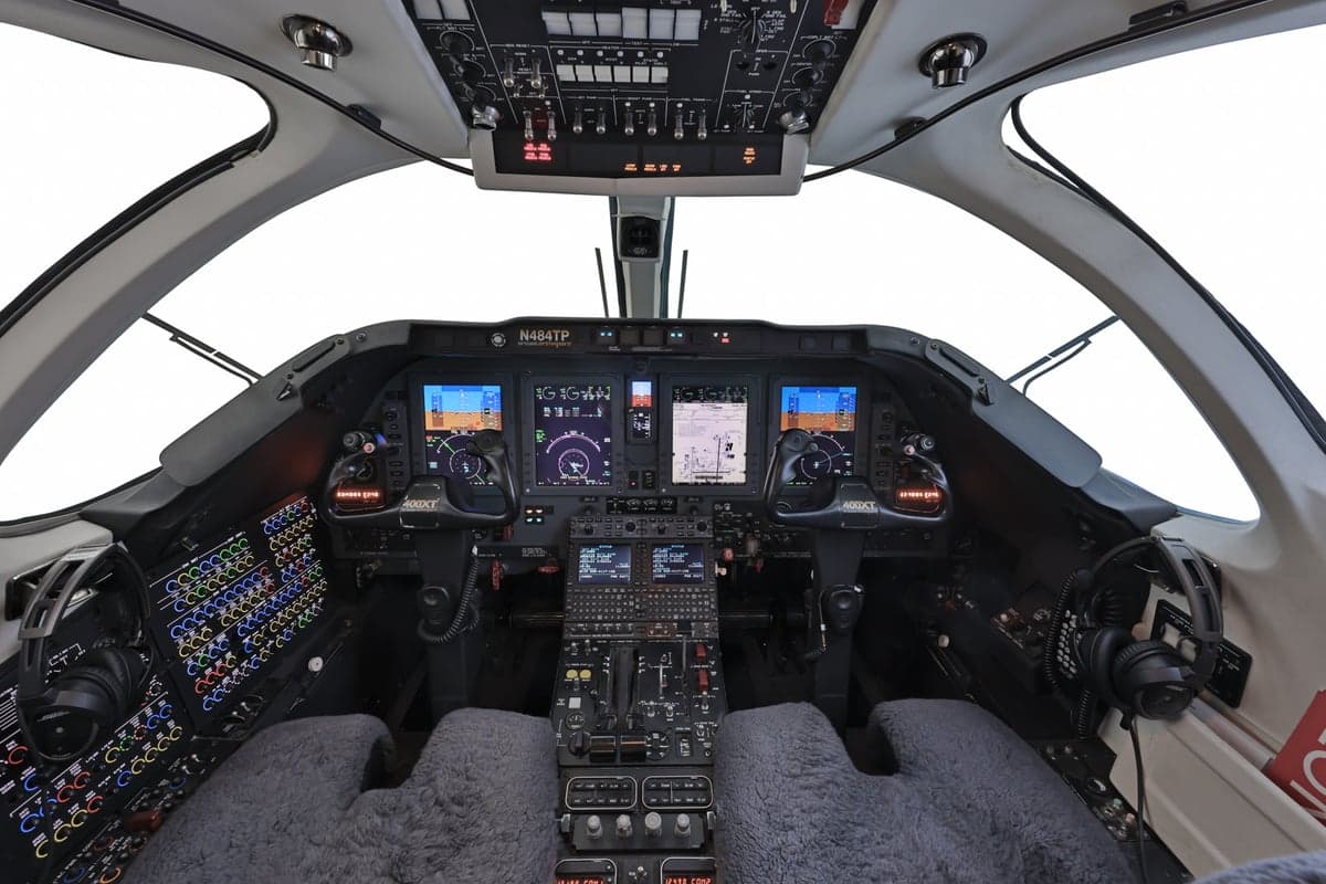 The cockpit of the Hawker 400XP features advanced avionics and controls.