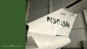 Tail of the Cessna CitationJet with the registration number N501SM.