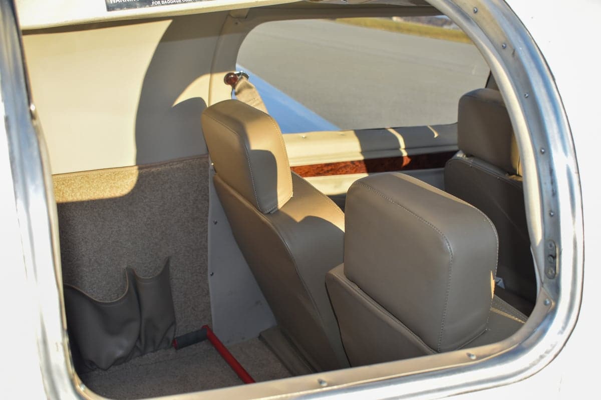 Close up of the aircraft's leather seats with armrests.