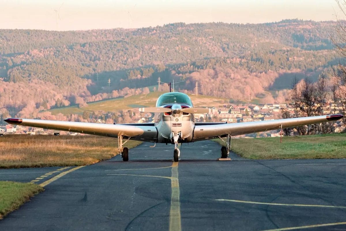 Front view of Beechcraft Bonanza N8918M on the runway.
