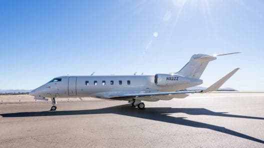 A Gulfstream G450 flying above the clouds.