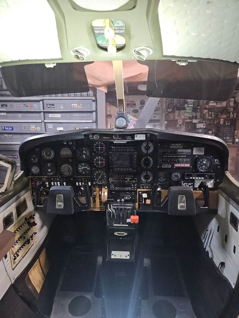 A view of the aircraft's instrument panel and controls.