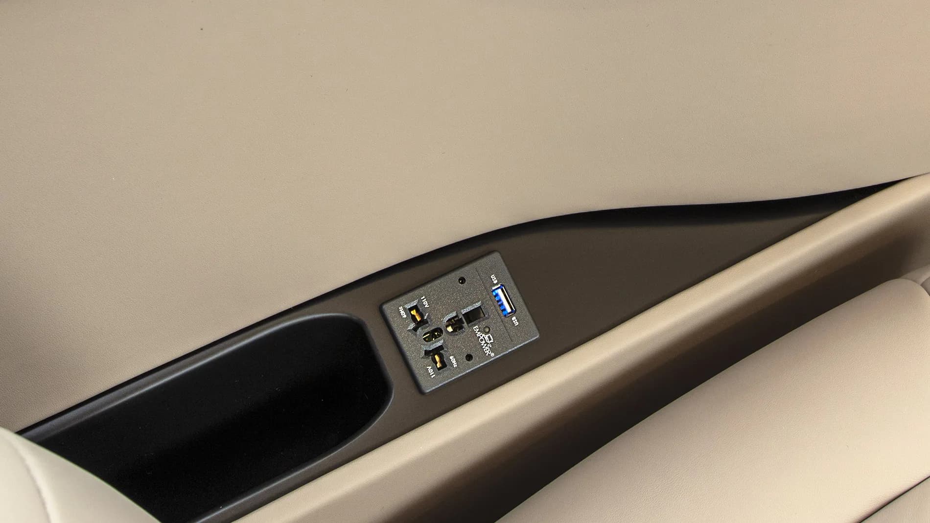 A close-up of the interior of the Pilatus PC-24, showing the USB charging ports.
