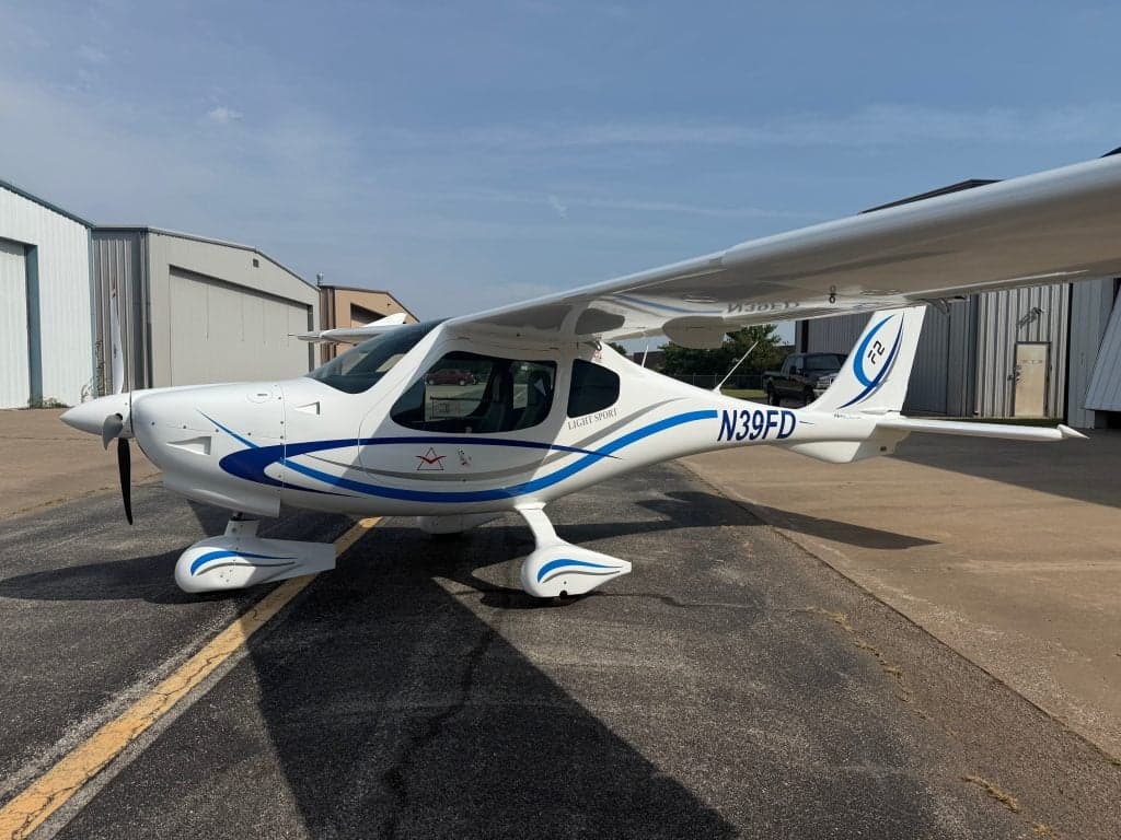 A Flight Design F2 aircraft with registration N39FD parked on the tarmac.