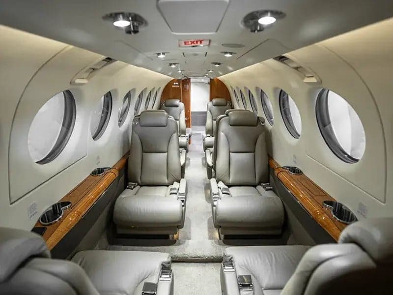 Interior view of the Beechcraft King Air 350i cabin with leather seats.