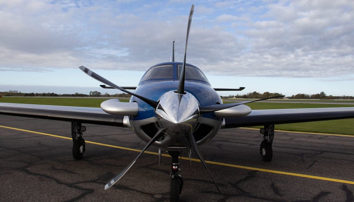 N80FY Piper M600 parked on the tarmac with a blue and silver paint scheme.