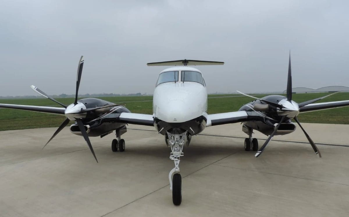 Front view of a King Air aircraft on the ground.