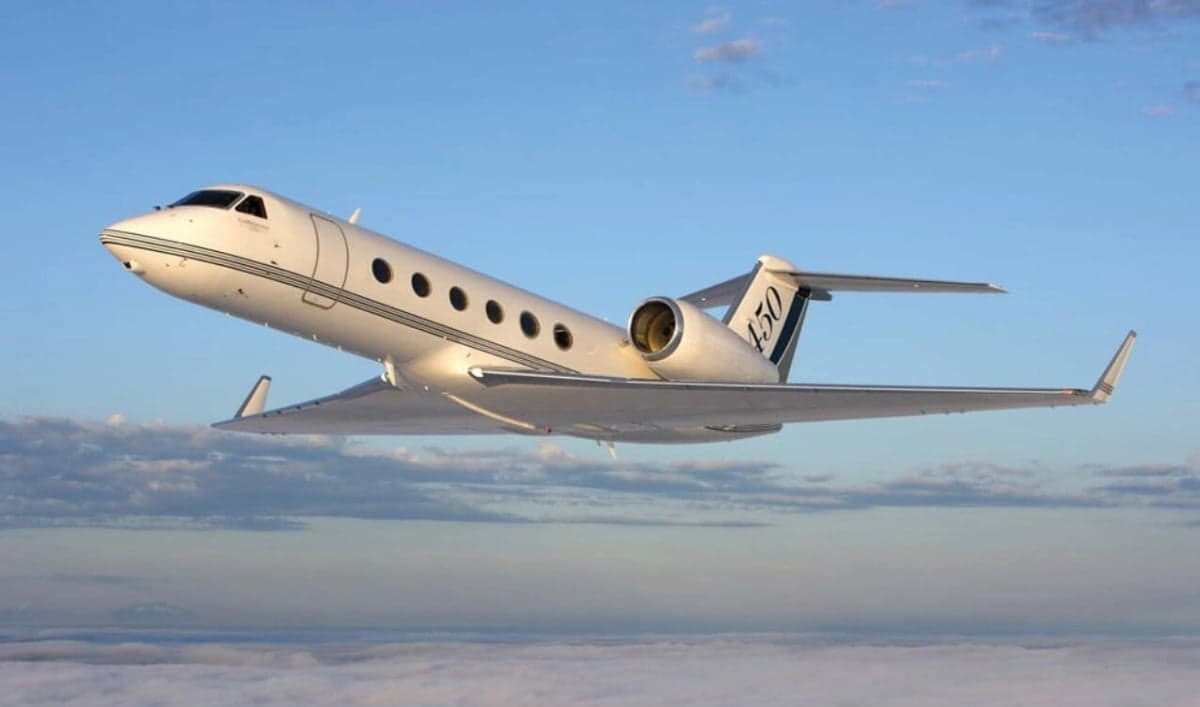 Gulfstream G450 in flight above the clouds.