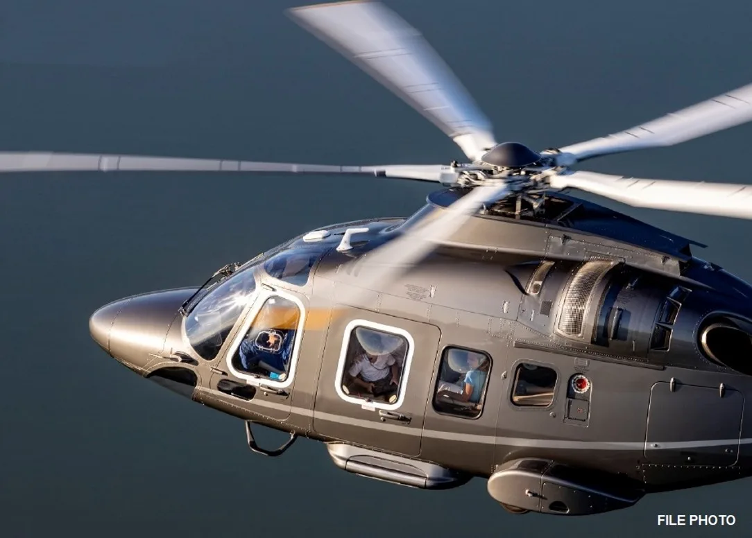 Close up of a helicopter in flight.