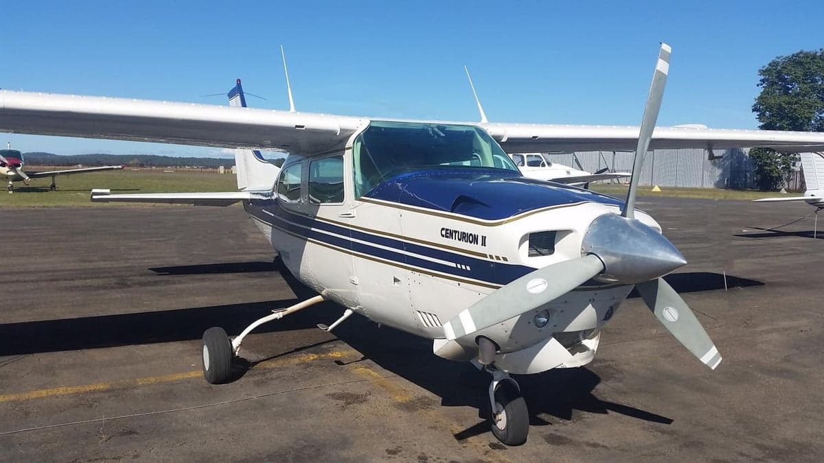 Front view of a Cessna Centurion II aircraft on the ground.