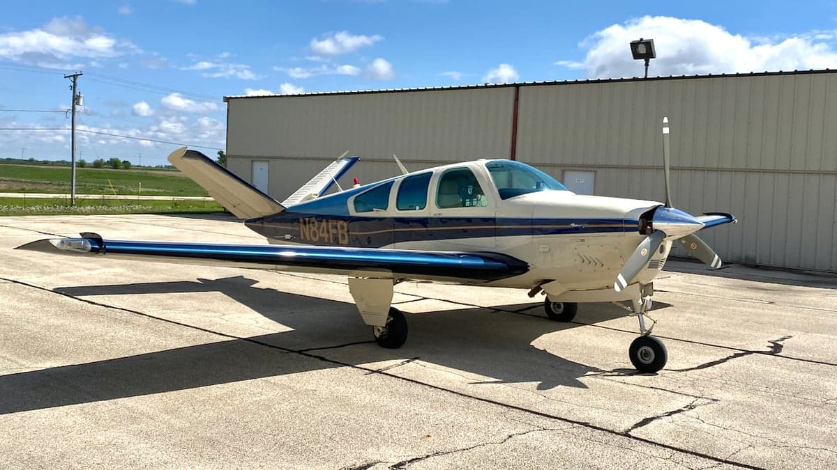 A Beechcraft Bonanza N84FB parked on the tarmac.