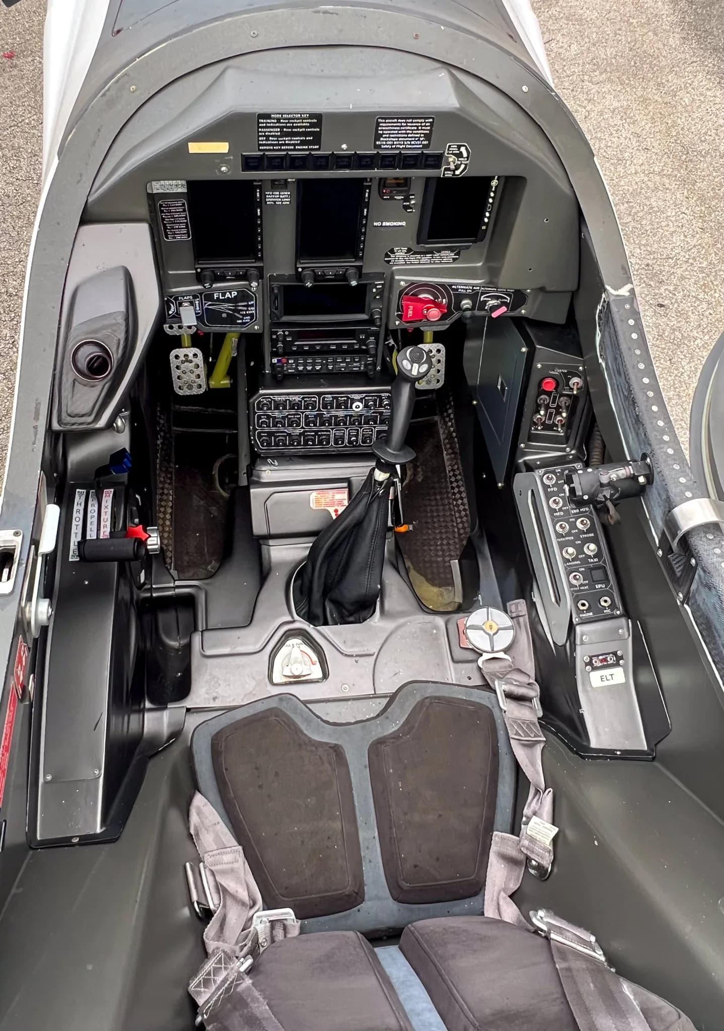 View of the cockpit instrument panel and seats of the Blackshape Gabriel aircraft.