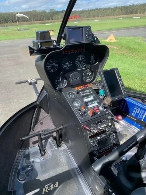 Robinson R44 cockpit instrument panel and controls.