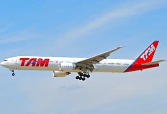 A TAM Airlines Boeing 777 is on approach for landing.