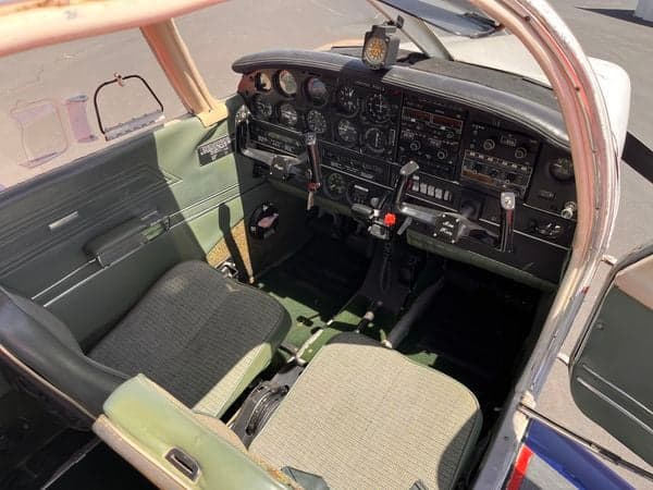 View of the cockpit and front seats of the aircraft.