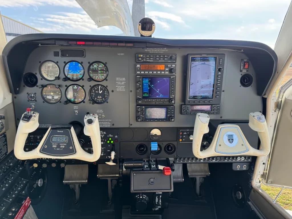 The instrument panel of the Beechcraft Bonanza with modern avionics.