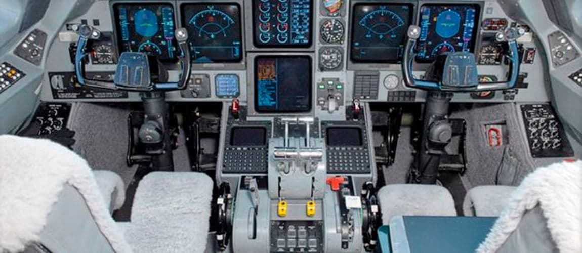 Full view of the Gulfstream G-IV cockpit with instrument panel and controls.